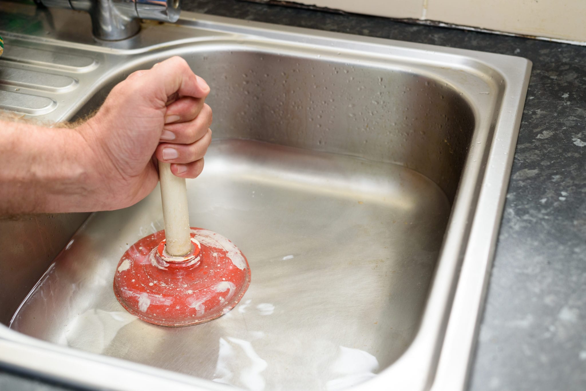 Use a Plunger to Remove Objects From Drain