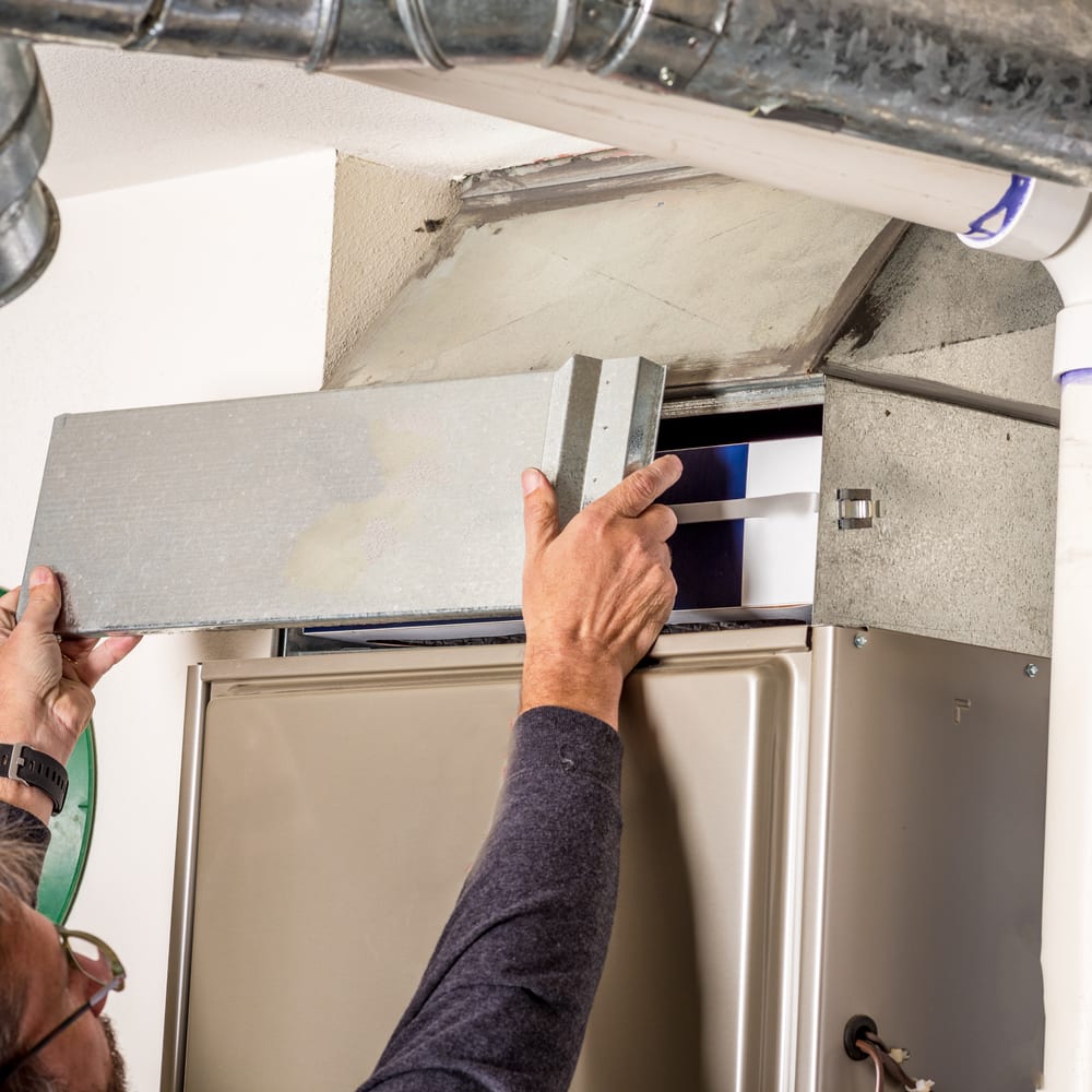 checking furnace filters and vents